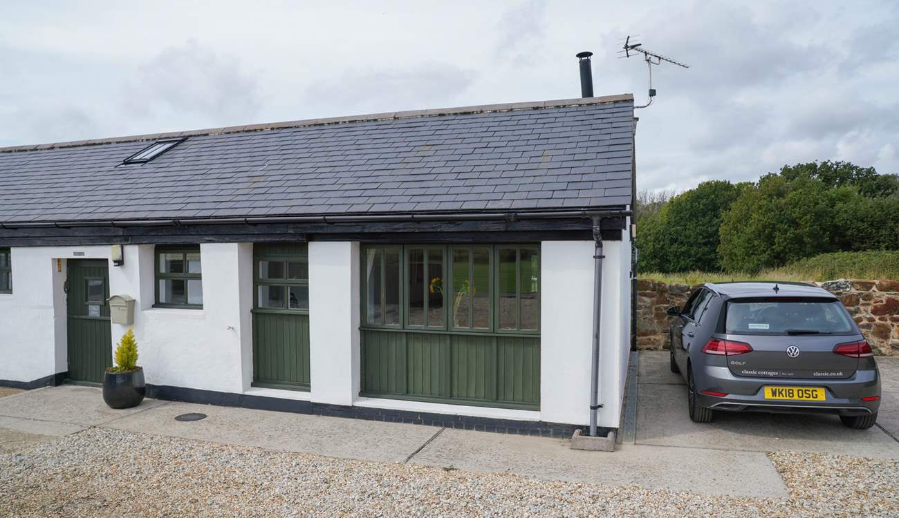 There is private parking for two cars. 