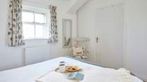 Bedroom 1 has been thoughtfully decorated with guests comfort in mind.
