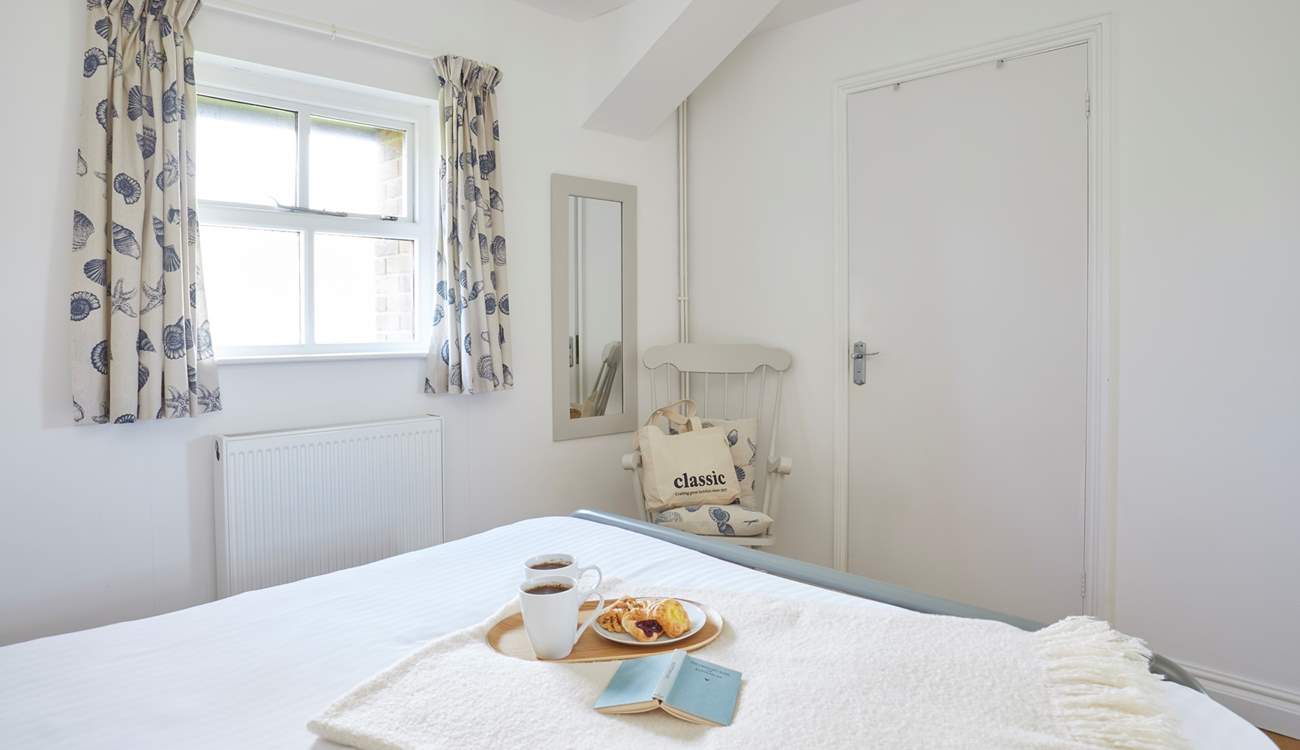 Bedroom 1 has been thoughtfully decorated with guests comfort in mind.