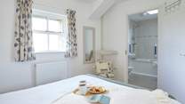 Bedroom 1 also benefits from and en suite bathroom.
