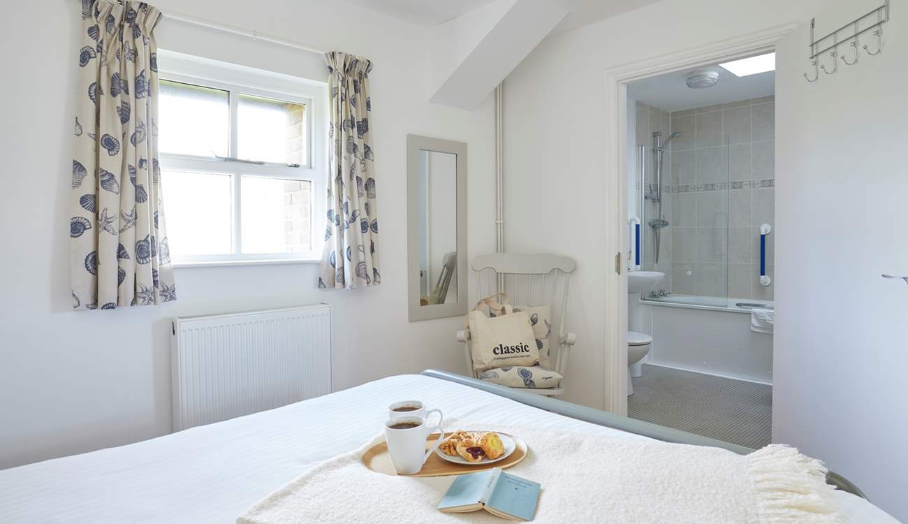 Bedroom 1 also benefits from and en suite bathroom.