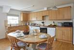 The spacious kitchen/dining-room is well-equipped.  