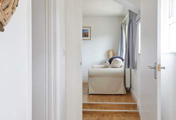 Please take care as there are two steps leading into the sitting-room.