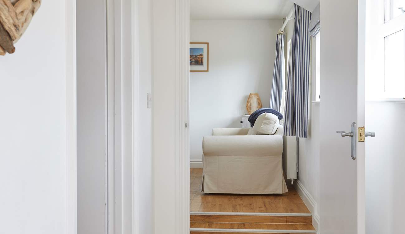 Please take care as there are two steps leading into the sitting-room.