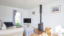 The lovely sitting-room leads out into the garden. 