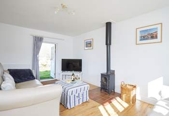 The lovely sitting-room leads out into the garden. 