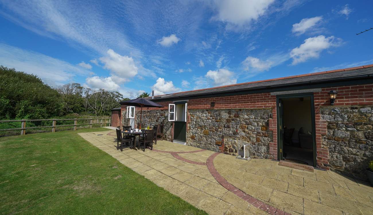 Relax with your own enclosed garden area overlooking the grounds.