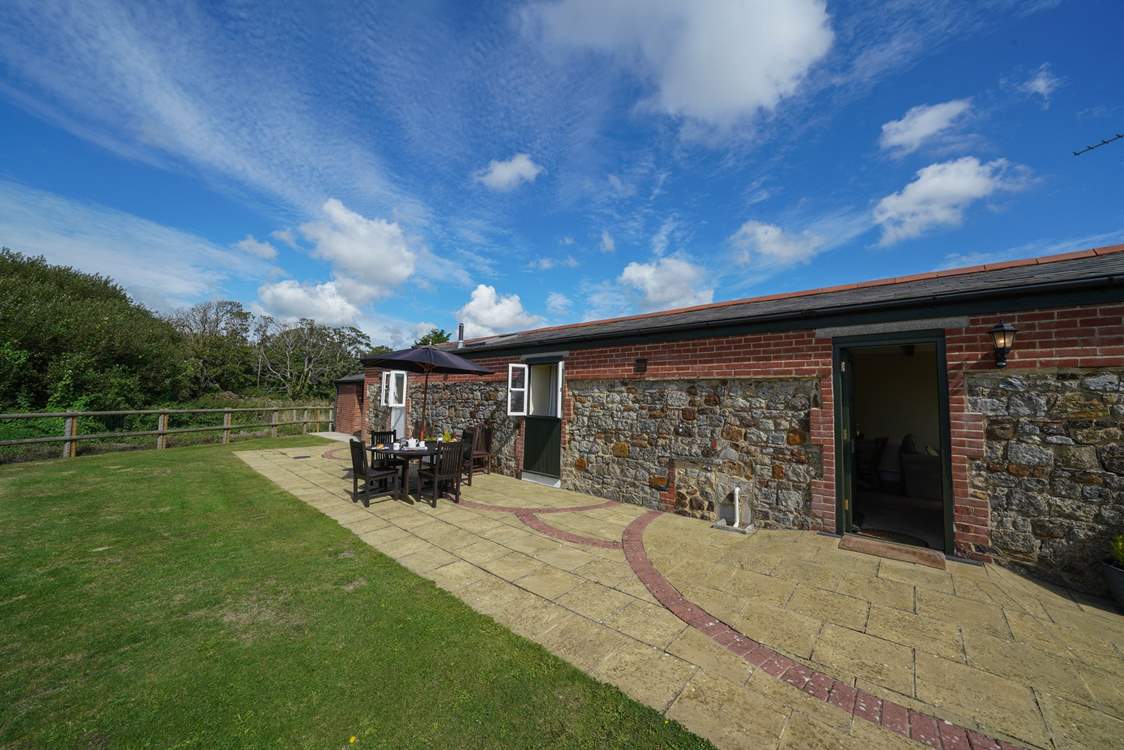 Relax with your own enclosed garden area overlooking the grounds.
