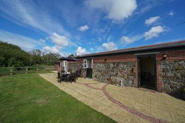 Relax with your own enclosed garden area overlooking the grounds.