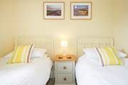 The bright twin bedroom.