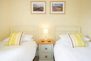 The bright twin bedroom.