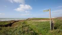Take a short drive to many walking spots, across the cliffs along Brook, which also leads down to Compton Beach.