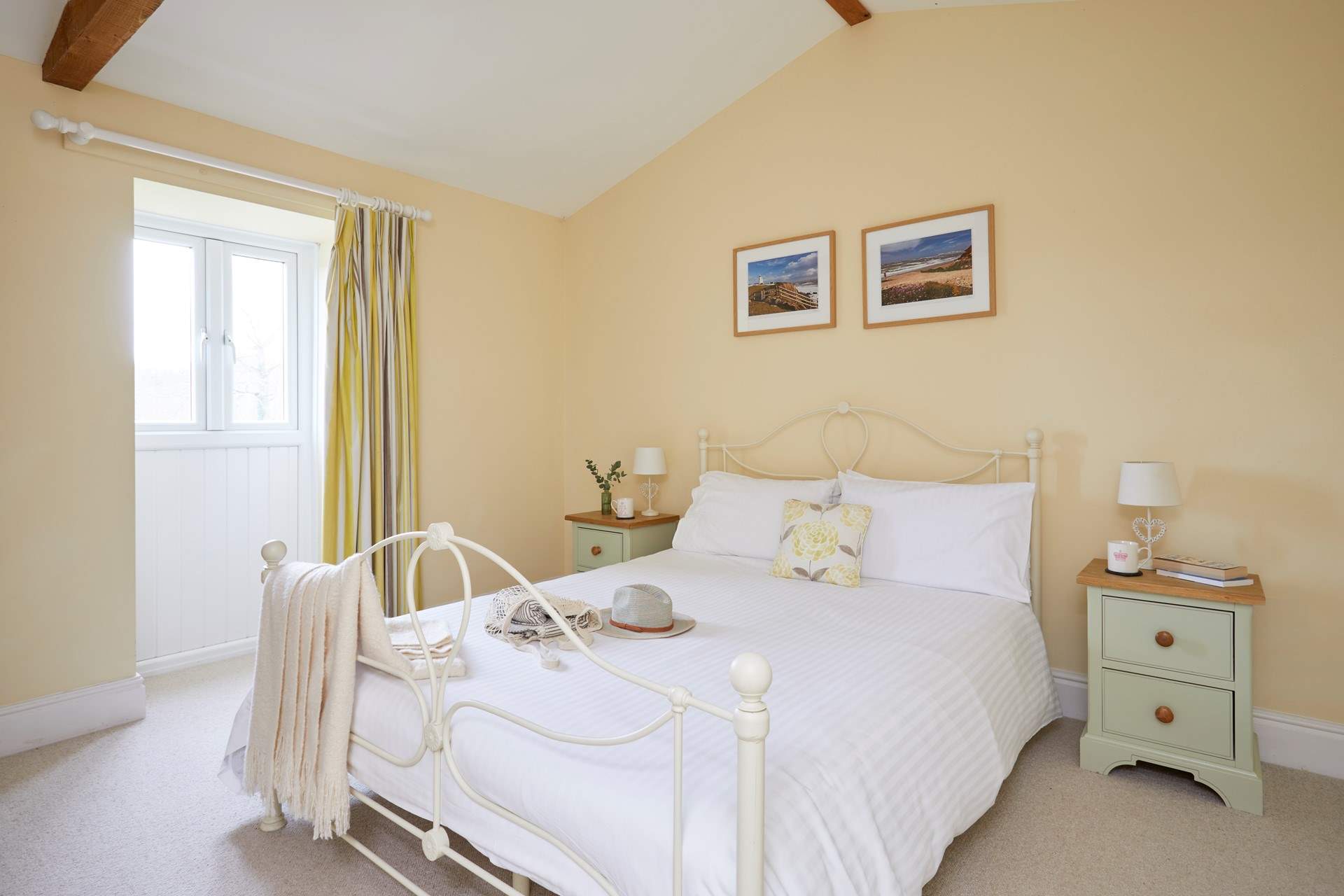 The spacious double bedroom overlooks the front garden area.