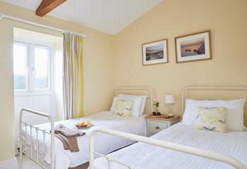 The pretty twin bedroom.