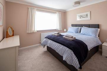 Bedroom 1 is home to this super-comfy king-size bed.
