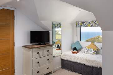 Bedroom 3 has a cute little window seat to snuggle up on.