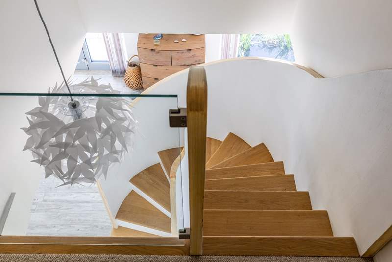 This gorgeous bespoke staircase leads off from the dining-room and up to bedroom 3. 