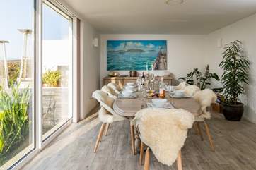 The large dining space that can easily accommodate up to 10 guests. Sit down for a long lazy lunch whilst the room is bathed in Cornish sun.