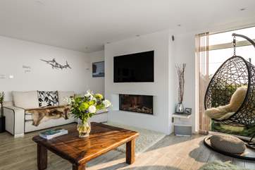 Contemporary furnishings marry seamlessly with the stunning views here.