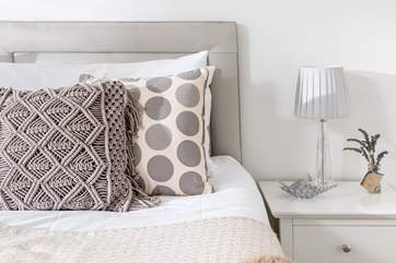 Fabulous bed linens and lovely adornments.
