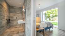 The ground floor double bedroom links to the dual access wet-room and shared with the twin bedroom. 