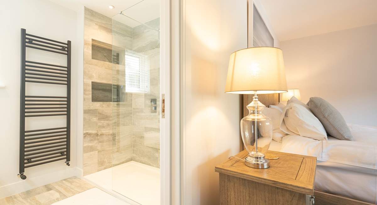 ...boasting a sleek en suite shower-room. 