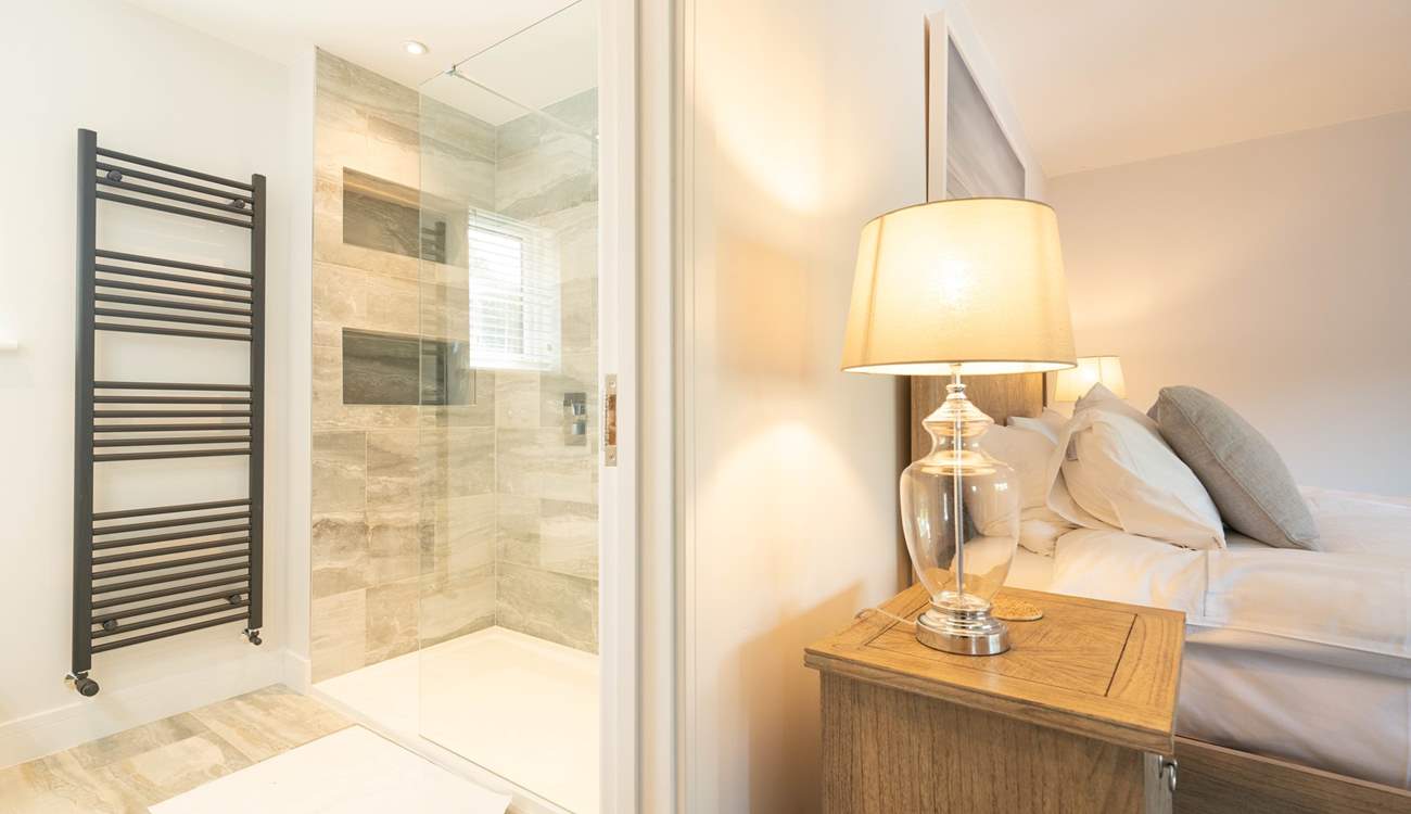 ...boasting a sleek en suite shower-room. 