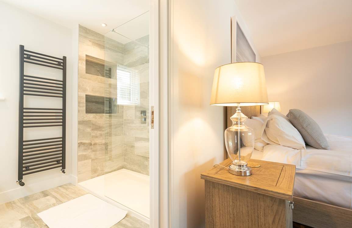 ...boasting a sleek en suite shower-room.