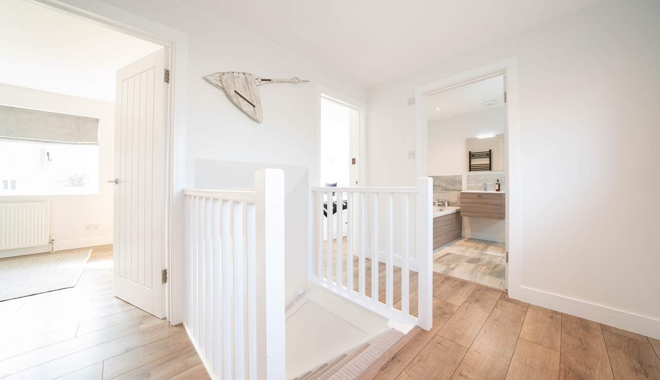 Subtle white and grey interior throughout setting a cosy and fresh feel.