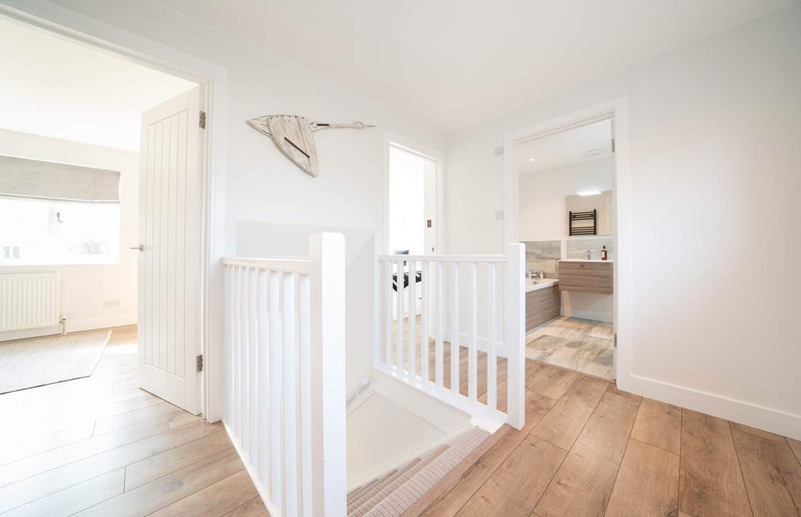 Subtle white and grey interior throughout setting a cosy and fresh feel.