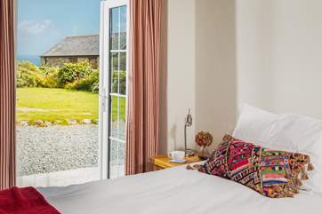 Look out into the garden from the super-king bed in the annexe.