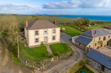 Situated on the grassy cliffs set above the village of Porthallow to the east side of the Lizard peninsula, with stunning views across fields down the St Keverne valley and over the sea to Falmouth Bay and the English Channel.