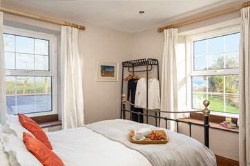 Calming tones and luxurious linens in (Bedroom 1).