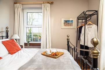 Each bedroom has lovely views out over the sea or pretty countryside (Bedroom 1).