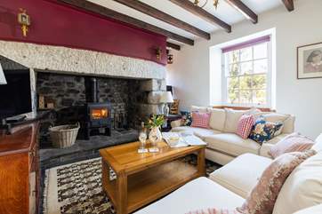 The second sitting room has plenty of room for everyone to relax together.