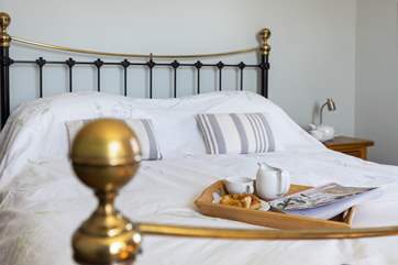 Stretch out in the super king bed (Bedroom 2).