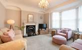 Stylish sitting-room with touches of pink. - Thumbnail Image