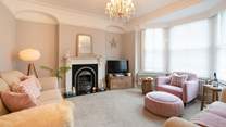 Stylish sitting-room with touches of pink.
