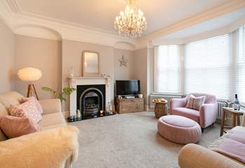 Stylish sitting-room with touches of pink.