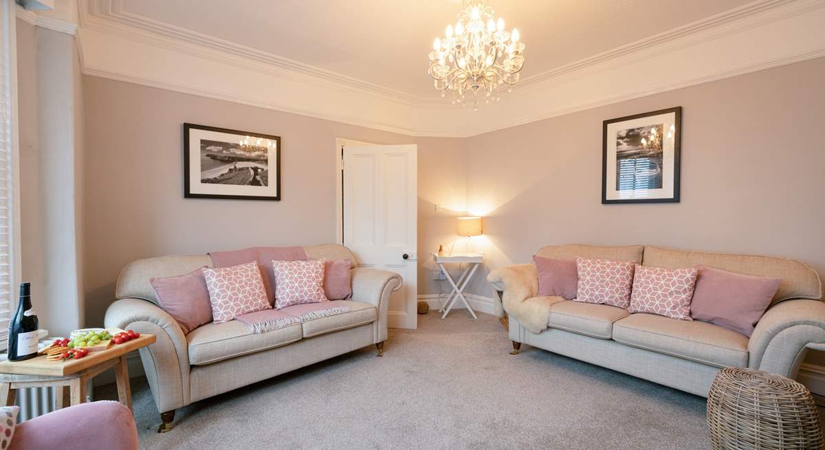 Front sitting-room has flair.