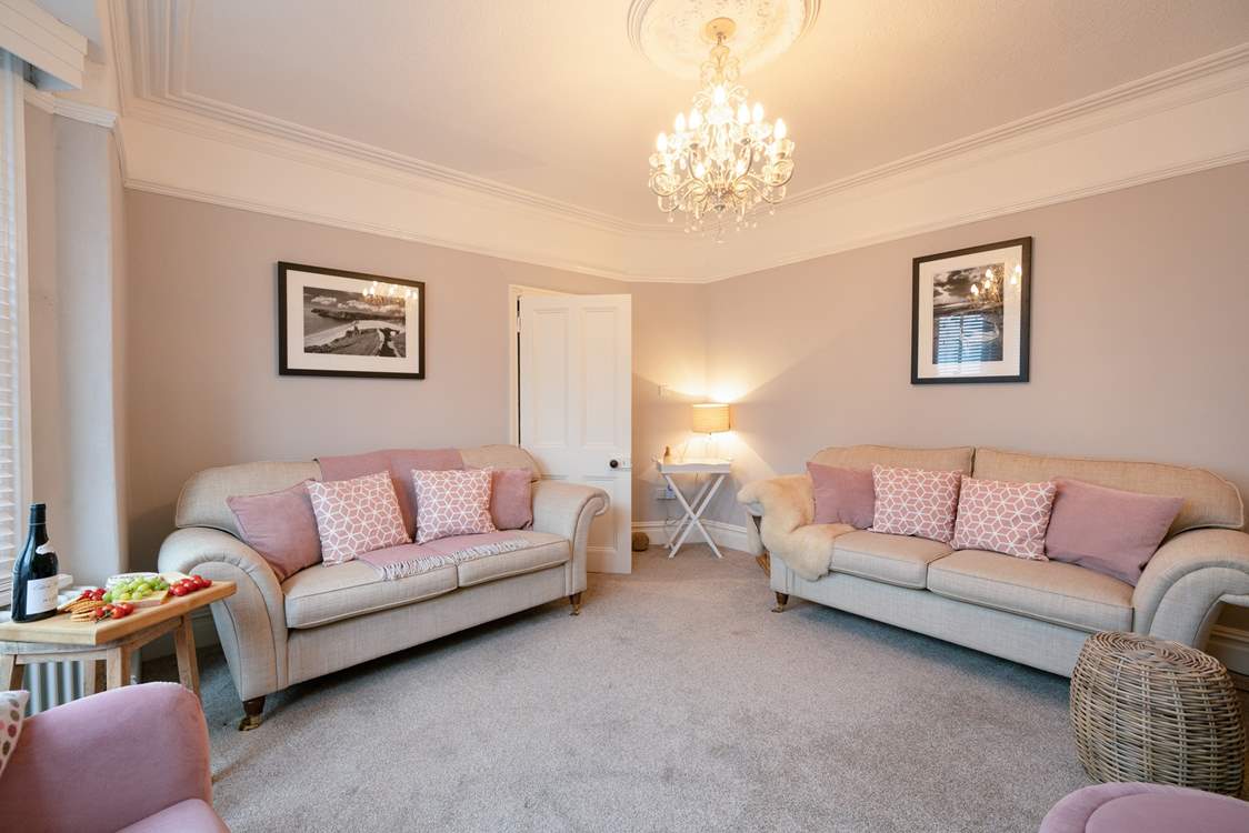 Front sitting-room has flair.