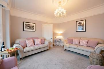 Front sitting-room has flair.