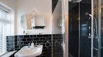 Separate shower in the family bathroom.