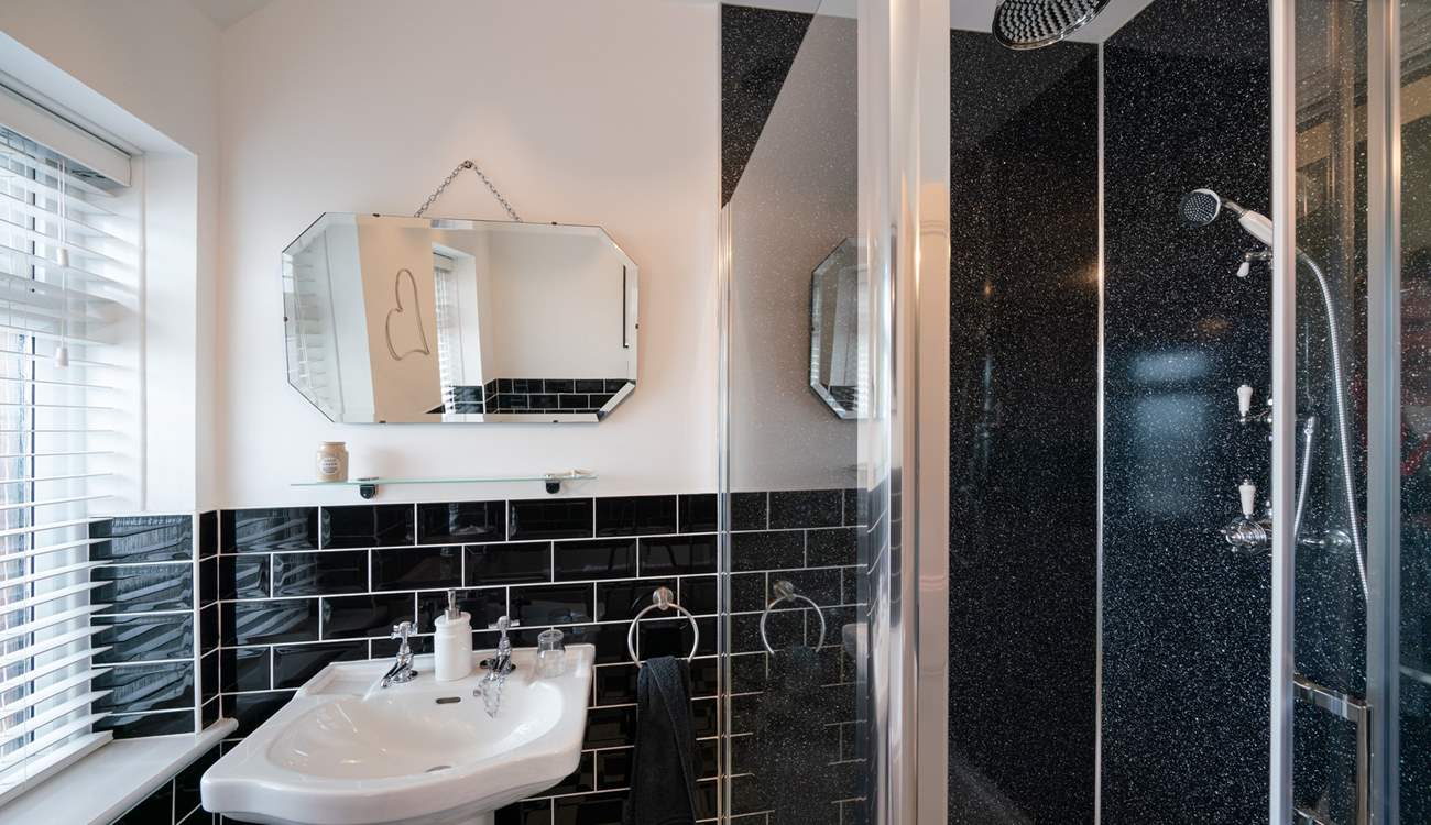 Separate shower in the family bathroom.