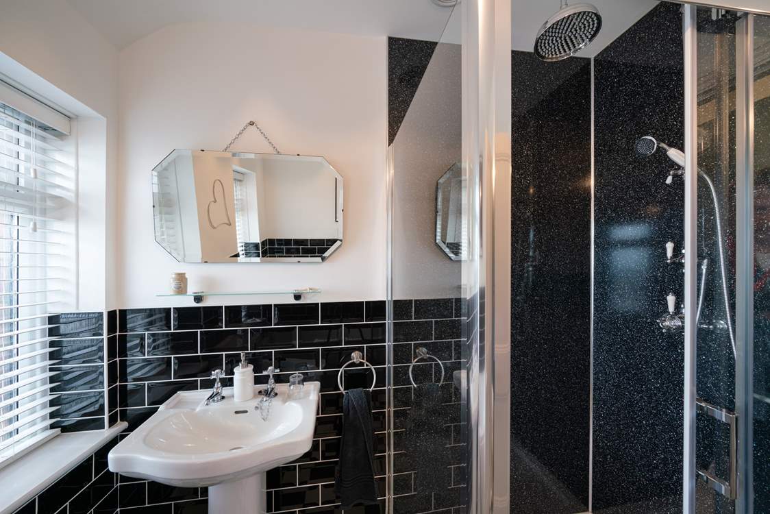 Separate shower in the family bathroom.