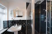 Separate shower in the family bathroom.