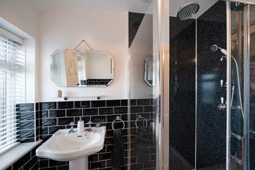 Separate shower in the family bathroom.