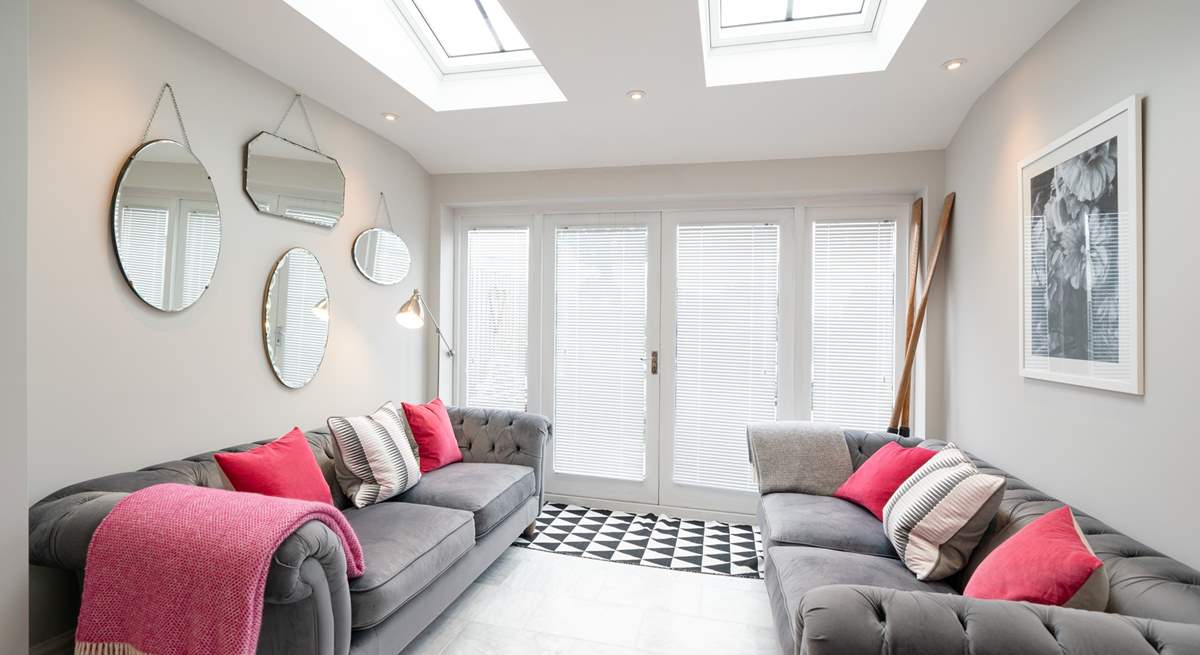 Comfy sofas off the kitchen.