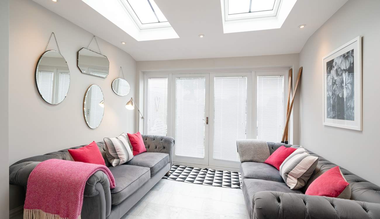 Comfy sofas off the kitchen.