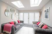 Comfy sofas off the kitchen.